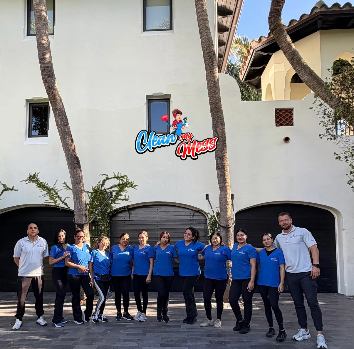 The Clean My Mess team in front of a Mediterranean villa