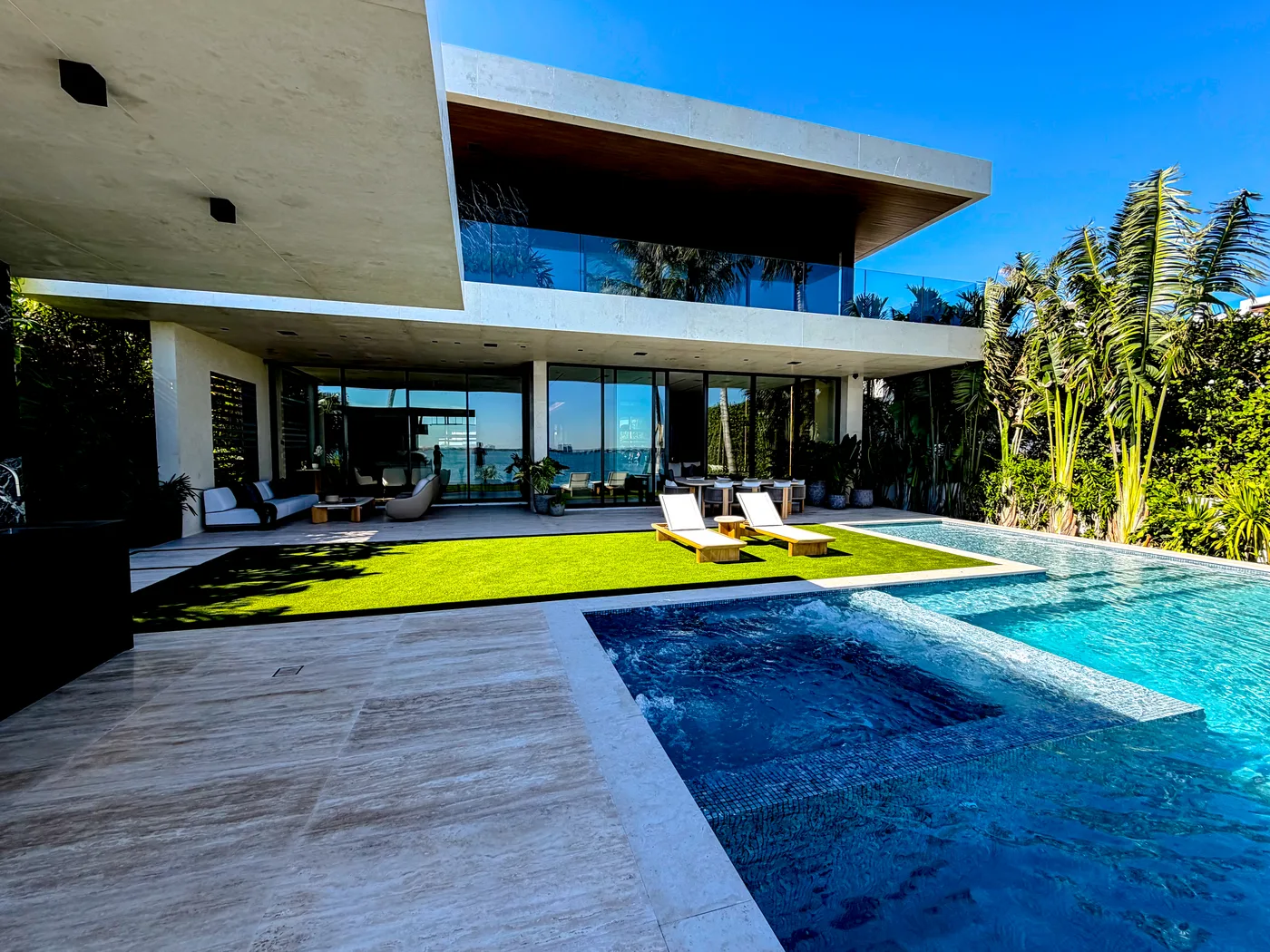 Modern waterfront villa with infinity pool cleaned by Clean My Mess